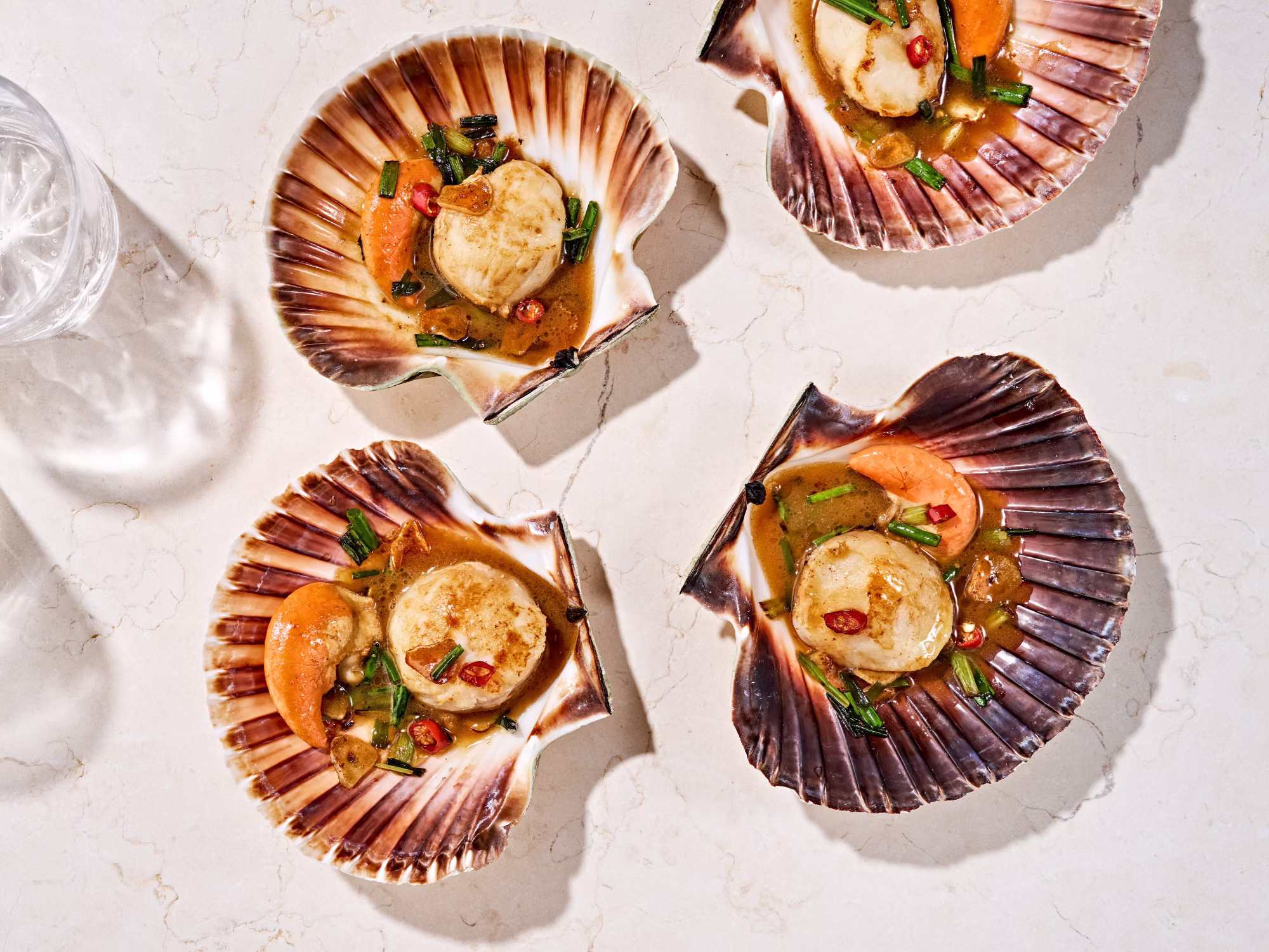 Coquilles met ponzuboter